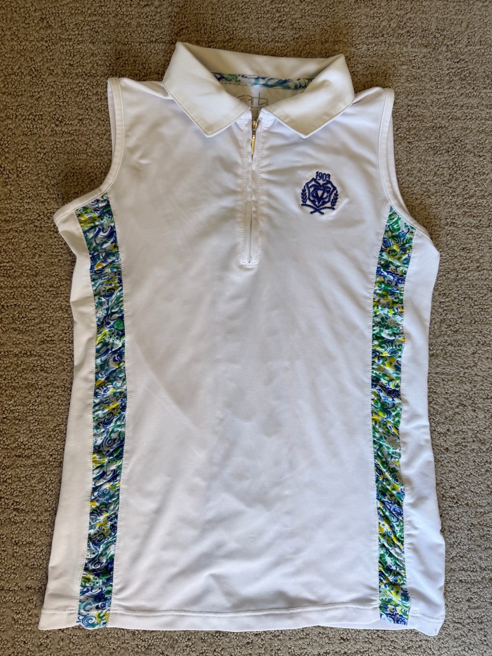 GARB Girls' White Sleeveless GOLF Top with floral print and SPF 50+